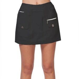 JAMIE SADOK - Black GOLF Skort with silver zippered pockets and 2 flap pockets.